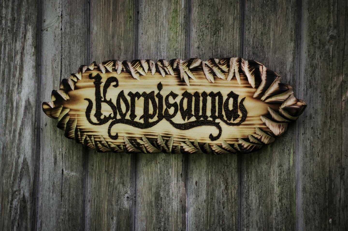 Korpisauna - kyltti